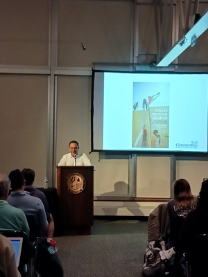 Dr. Marwan Darweish beginning his talk on nonviolent resistance in Palestine