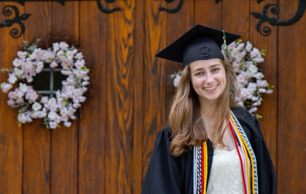 Loyola graduating senior Sophie Jobe in cap and gown.