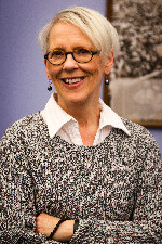 Dr. Barbara Vann posing arms folded.