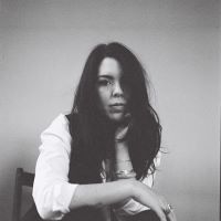 black and white photo of T. Kira Maden