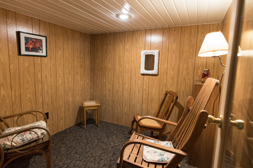 Confessional room with three rocking chairs