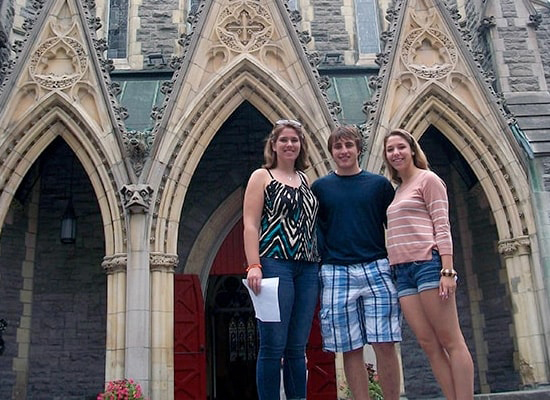 Loyola students pose in front of Christ Church Cathedral in downtown Montreal