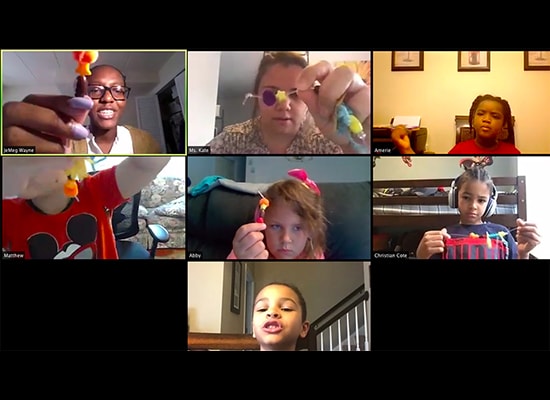 Screenshot of children working on arts and crafts projects on a Zoom conference