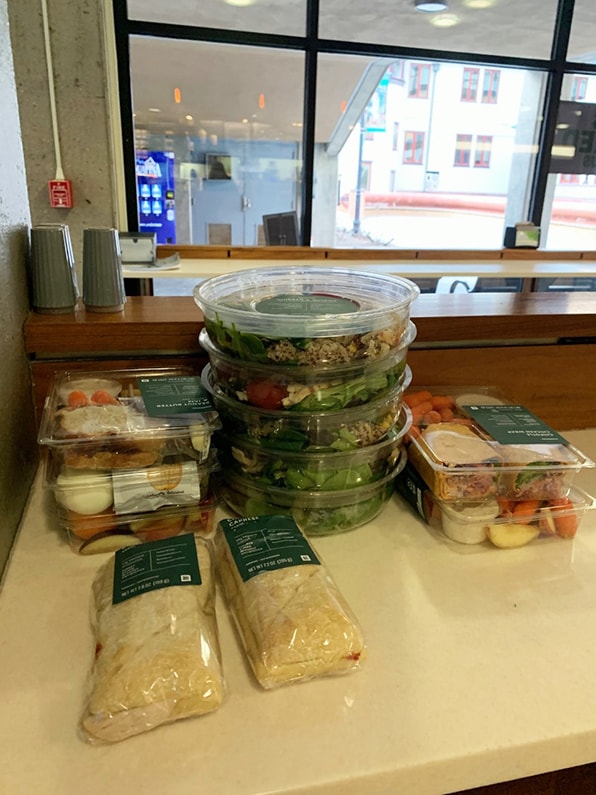 An assortment of packaged meals sitting on a table