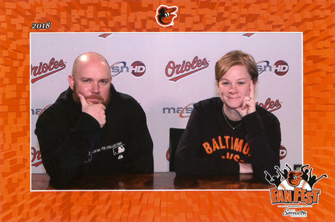 Mike and Kate Clark together at an Orioles press conference table.