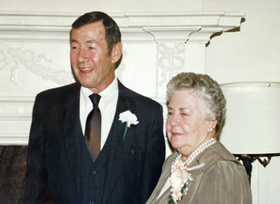 Donald and Lora Nelle Cohill smiling and posing for a photograph