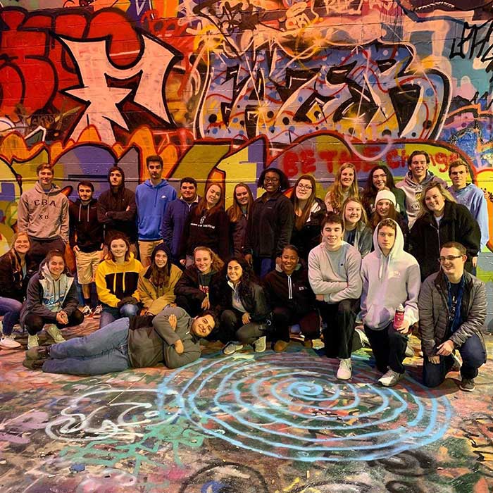 A group of Messina students at graffiti alley in Baltimore City