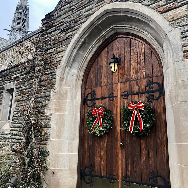 Christmas wreaths on wooden chapel doors
