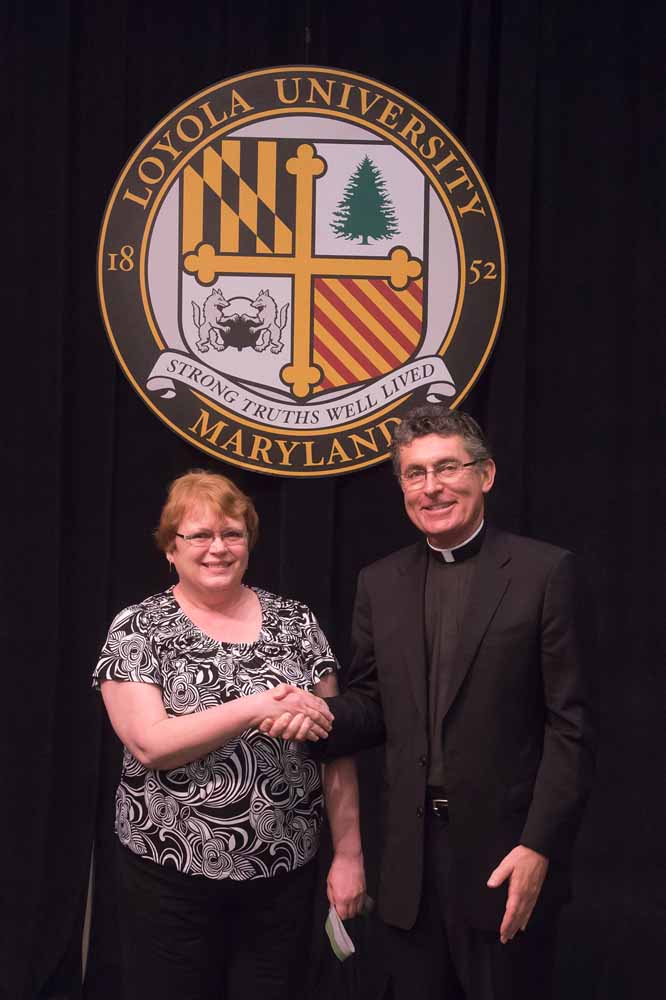 Brenda Blake (accepting award for son Richard Blake) and Fr. Linnane