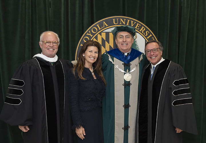 Jim Forbes, Constance Fernandez, President Rev. Brian Linnane, S.J., and Mike Fernandez