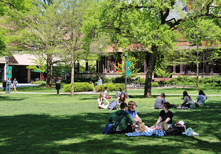 Students sitting on the Quad at Loyola University Maryland
