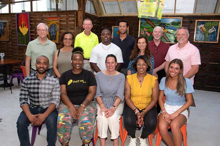 Members of the 2020-2021 cohort of the Loyola Baltipreneurs Accelerator, advisors, and mentors at the Terra Café in July 2021