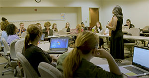 Teacher and students in a Master's in Curriculum and Instruction for Social Justice program class at Loyola