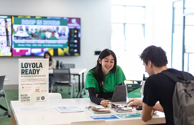 Two students talk in the Rizzo Career Center