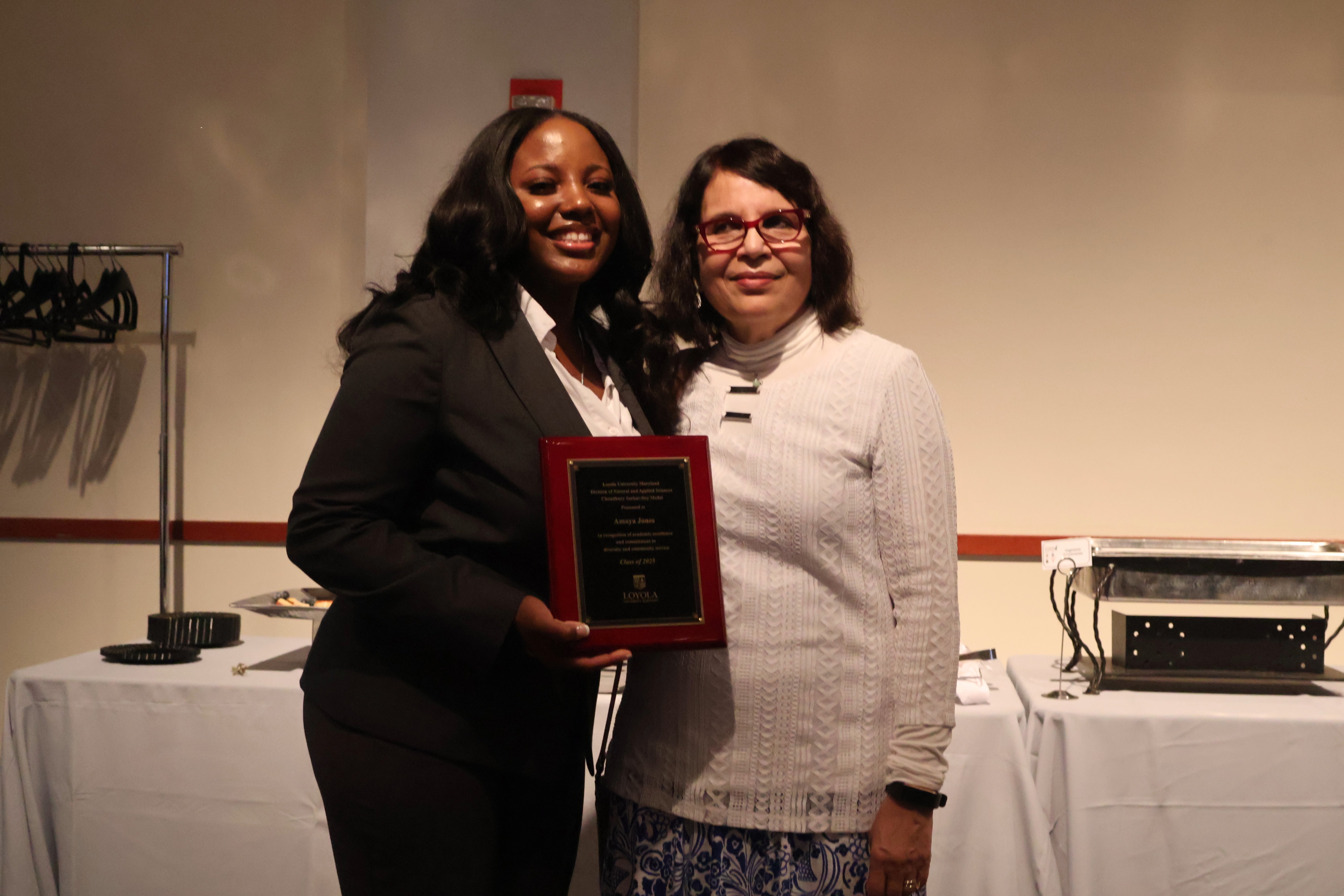 Amaya Jones-Core poses with Dr. Sarkar-Dey