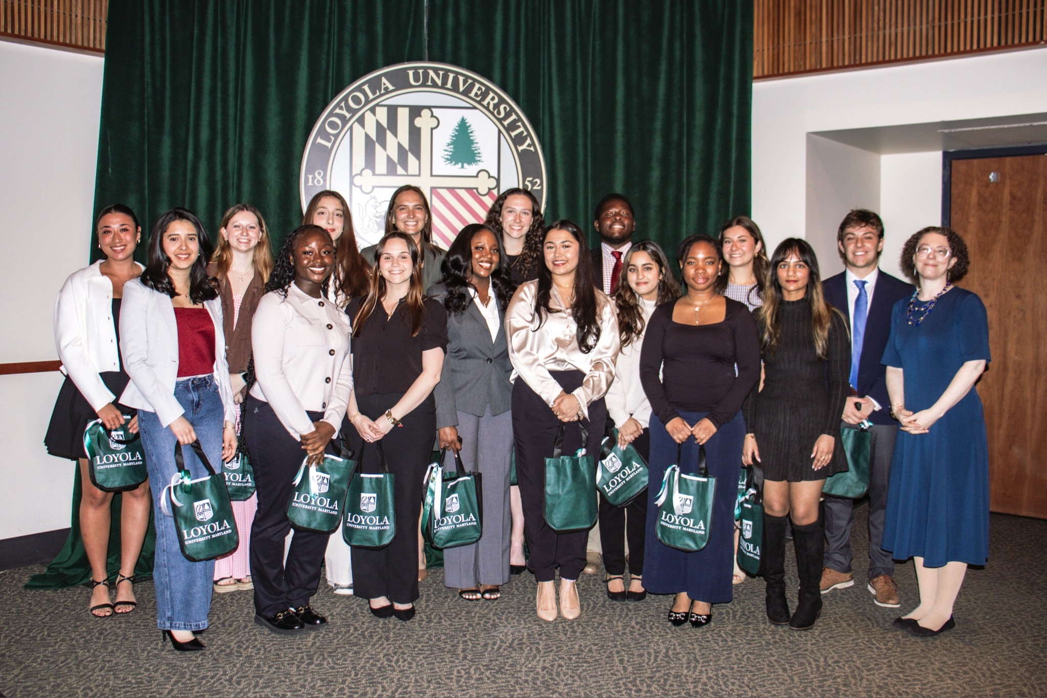 Senior biology students pose with Dr. Sheifele at 2025 STEM Excellence Event