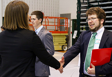 2 people shaking hands