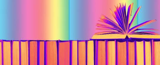 A stack of rainbow books