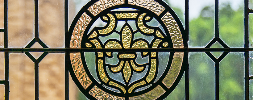 close up of stain glass in the humanities building on Loyola Main Campus