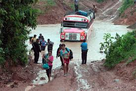 A bus partially submerged in a river in Nicaragua