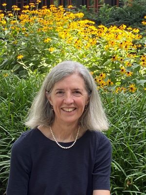 Dr. Morgan in a garden of black-eyed susans