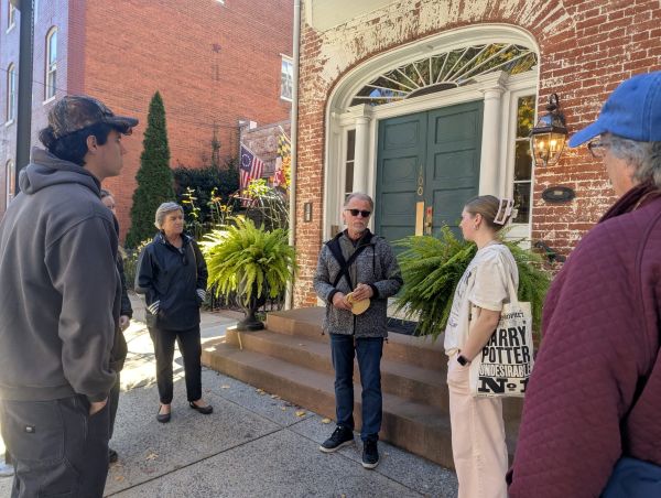 Dr. Colombat leading a tour group