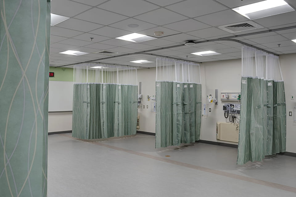 Clinical and Simulation Lab patient bays, separated by privacy curtains