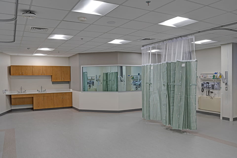 Control room, cabinets, and patient bay in the nursing simulation lab