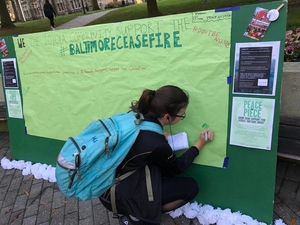 Students on the quad stand in solidarity with the Baltimore Ceasefire initiative