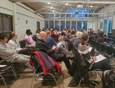 Side angle of audience at lecture by Dr. Michael Loadenthal