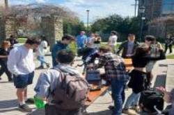 Crowd by solar scopes for Eclipse
