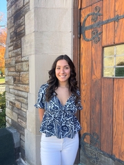 Brianna Silva posing by the Alumni Memorial Chapel