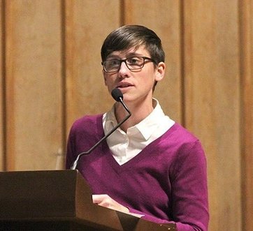 Dr. Shoenberger speaking at a podium