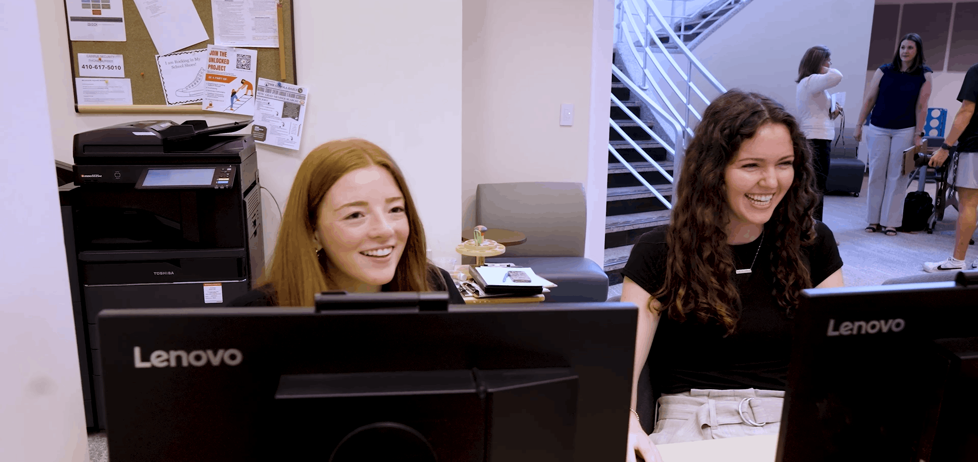 Mairead smiles with a member of her cohort in the Loyola Clinical Center at Belvedere. - Press enter to play