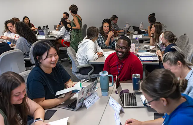 Graduate students in a classroom