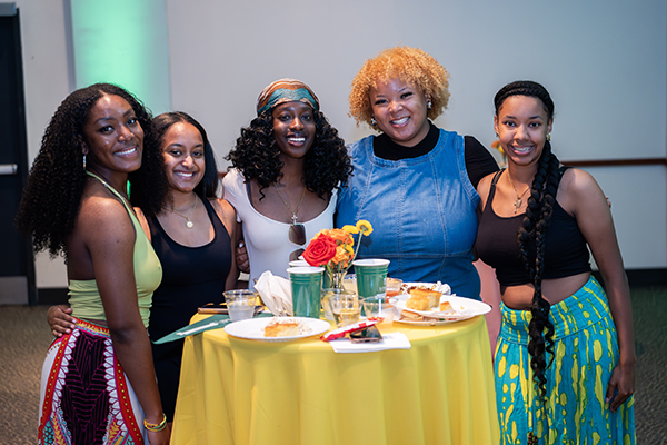 A group of soon-to-be Loyola alumni poses for a photo at the 2025 Senior BBQ
