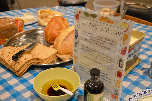 Plate of food in Foods in Our Faiths 2025 with a description that says "Oil and Vinegar"