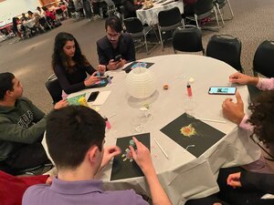 Students painting during Diwali celebration