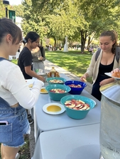 Students enjoying apples and honey at the Sukkot Celebration