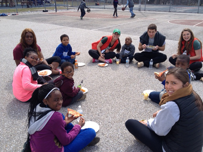 Students taking a break sitting in a circle