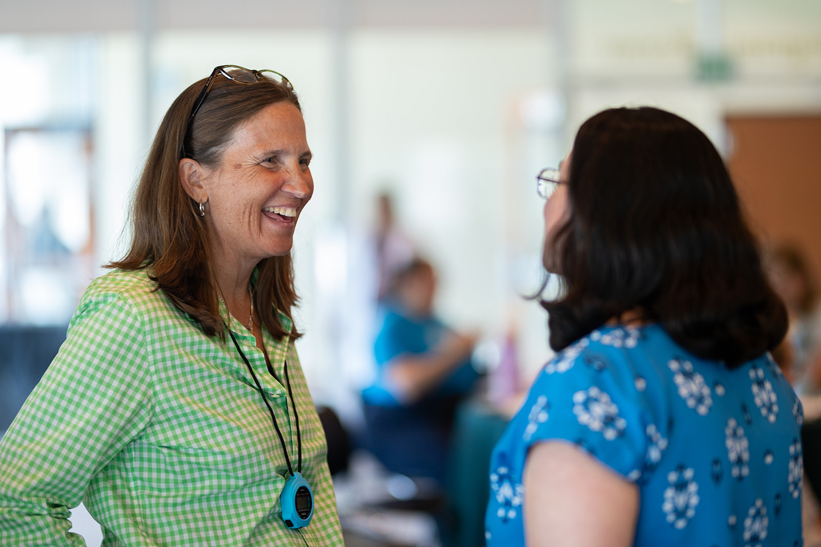 Carey Borkoski speaking with participant
