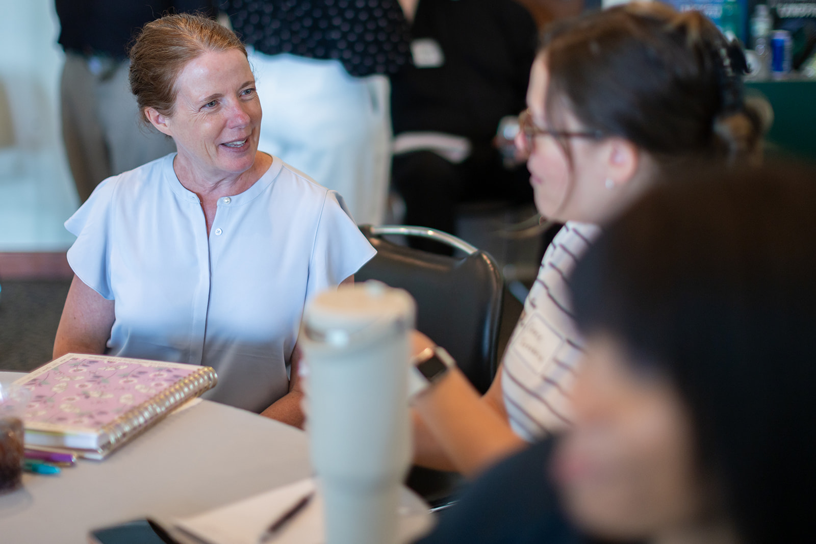Katherine Keefe speaking with a participant