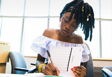 student working at desk