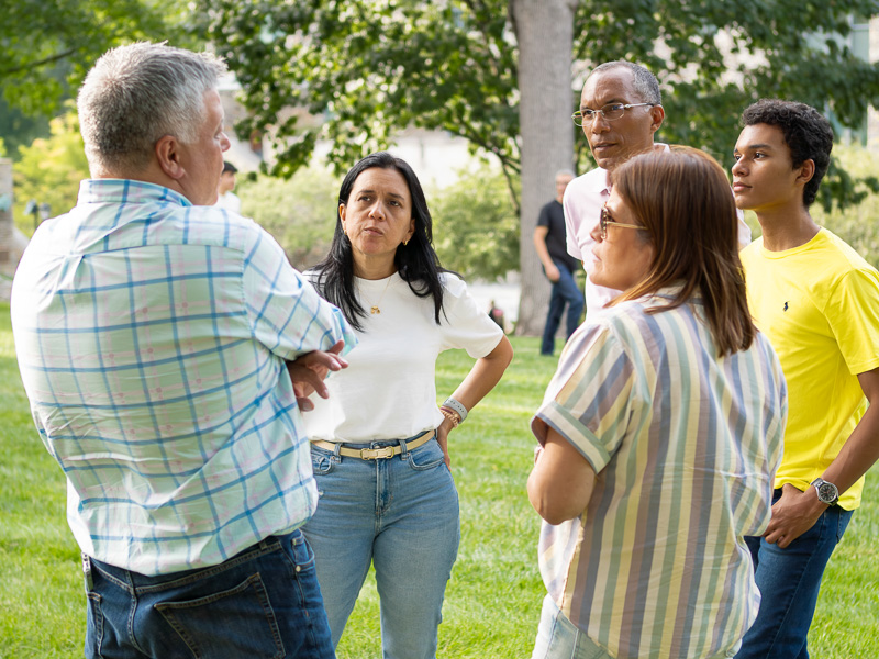 a group of people having a serious conversation