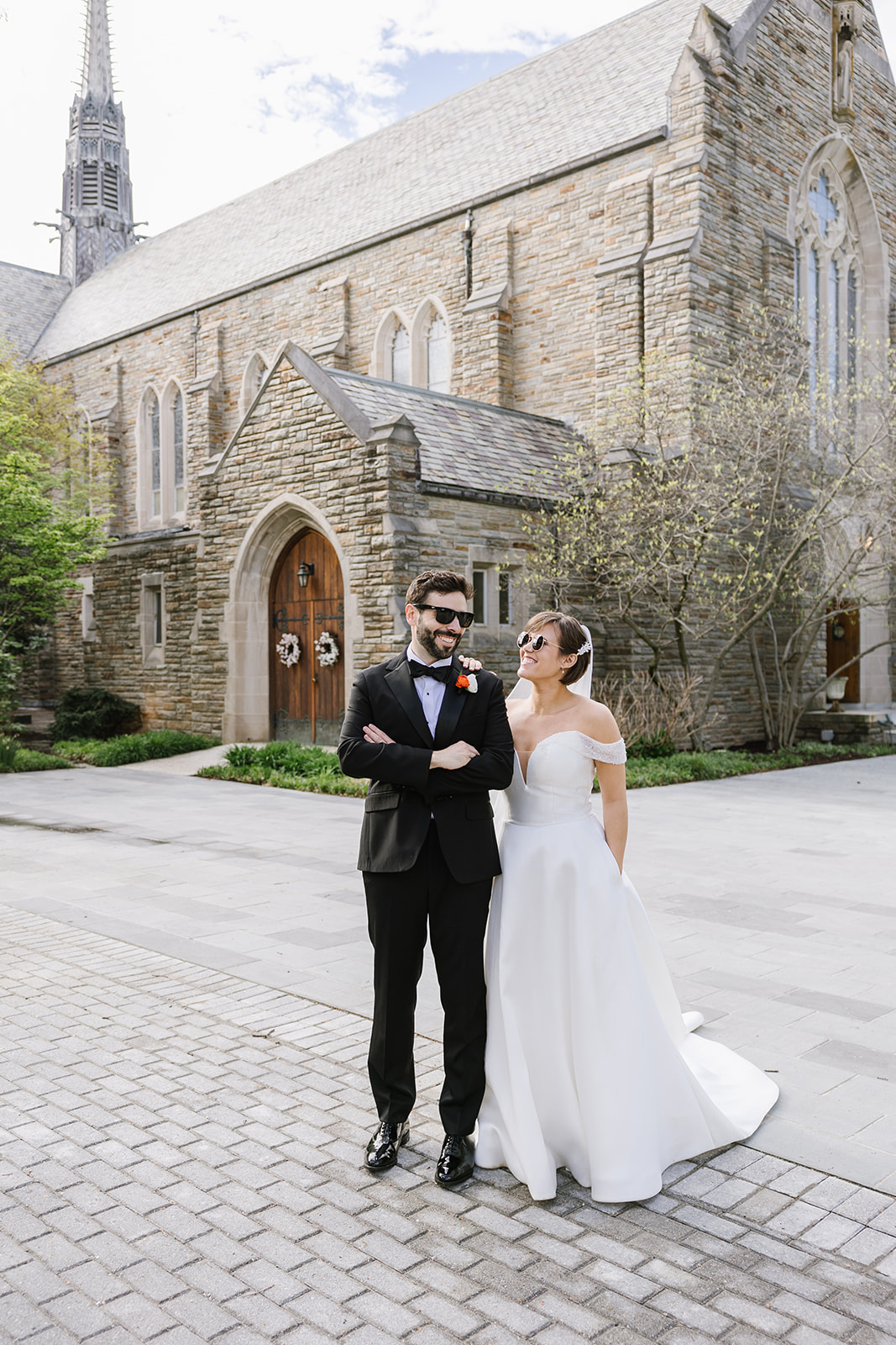 Bridal party poses on the porch of the Hug Lounge and Refectory. Urban Row Wedding 373. Photo credit ©️Urban Row Photography www.urbanrowphoto.com 