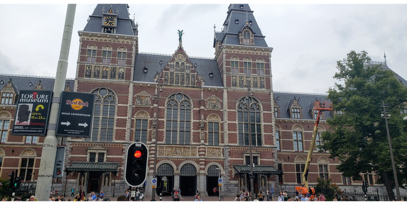 Main building at a station of Amsterdam in the background