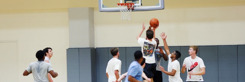 Students playing basketball