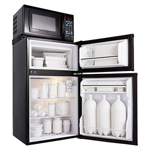 A microfridge sized for a dorm room with a microwave oven on top