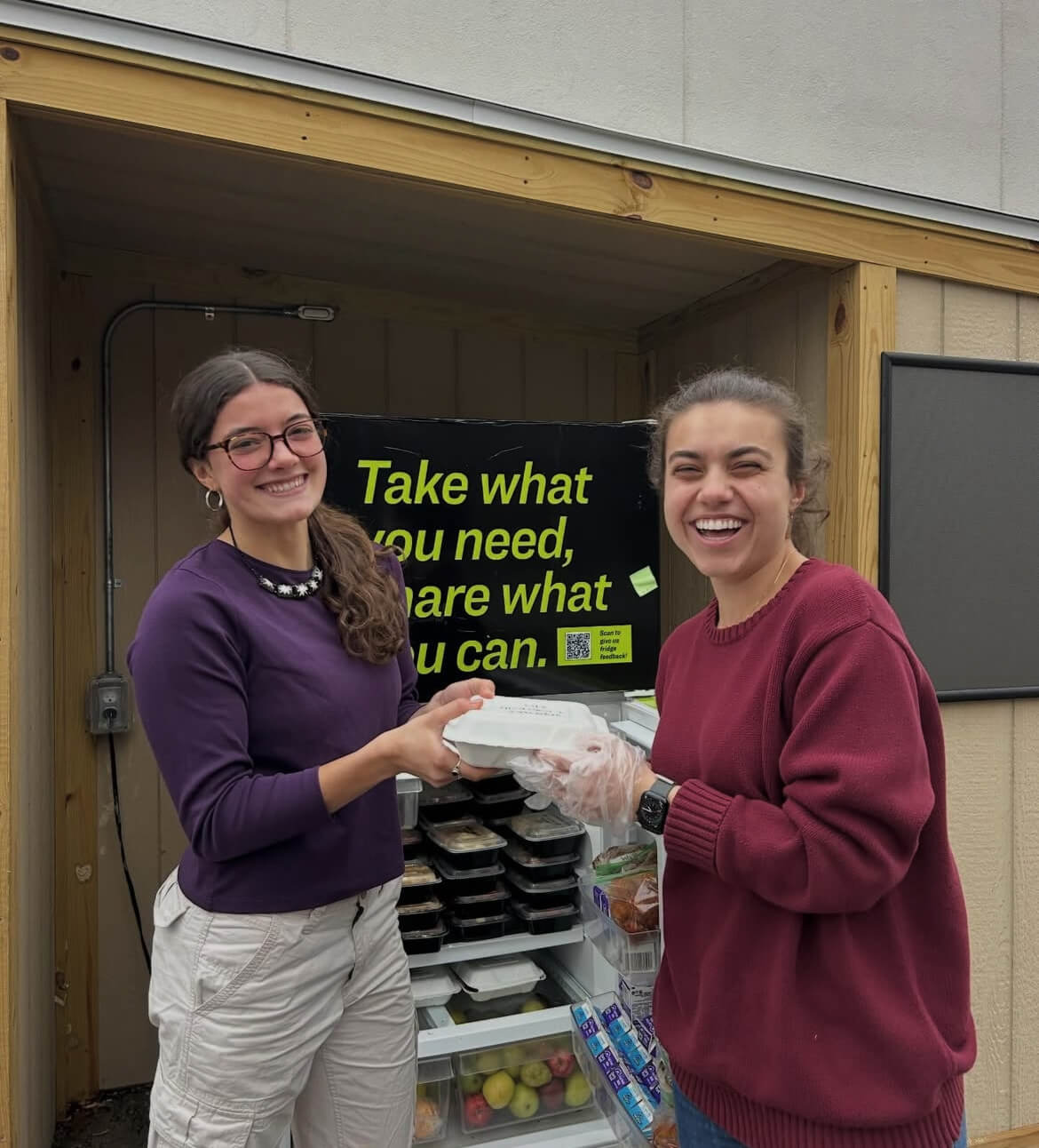 Govans market fridge with students