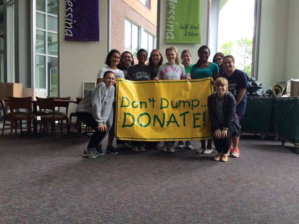 good stuff student employees holding a dont dump, donate sign